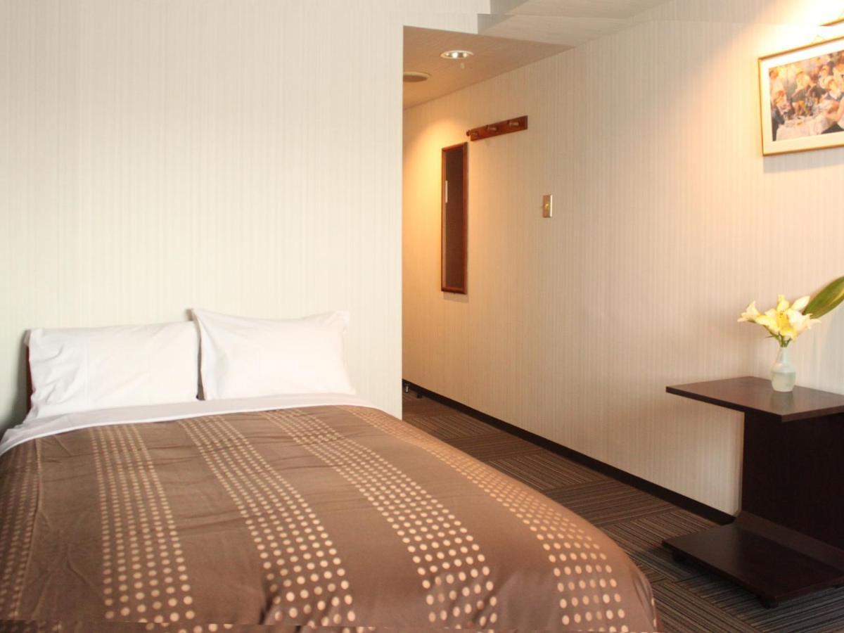 Hotel Livemax Budget Tokyo Hamura Ekimae Rum bild